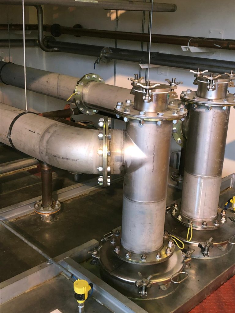 Scottish highlands distillery installing stainless steel pipework