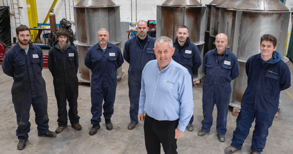 Managing Director, Andy Walker is pictured in front of the Walker Engineering team